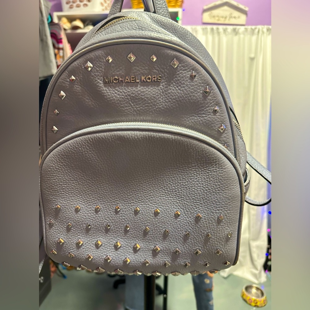 Michael Kors Blue studded back pack purse in great condition